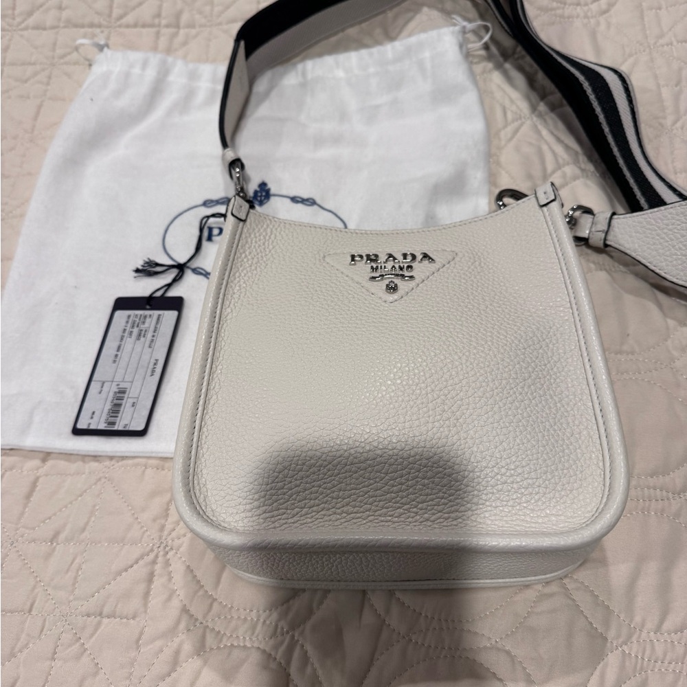 PRADA
Mini Daino Soft Leather Hobo Crossbody Bag
